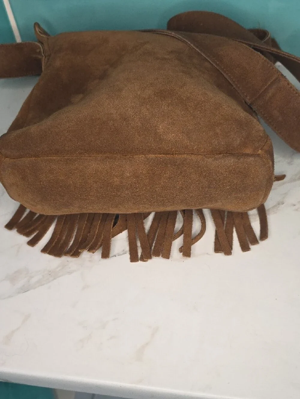 Minnetonka Fringed Suede Crossbody Bag in Brown